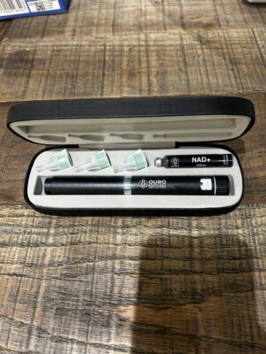 Ouro Peptides Premium Pen with NAD+ cartridge and disposable cartridge tips in presentation case